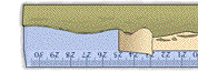 Peeling tape and putty from the ruler